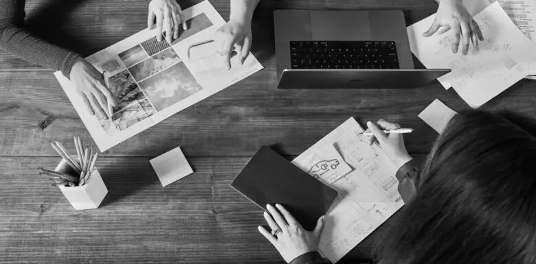 Designers collaborating in a meeting.